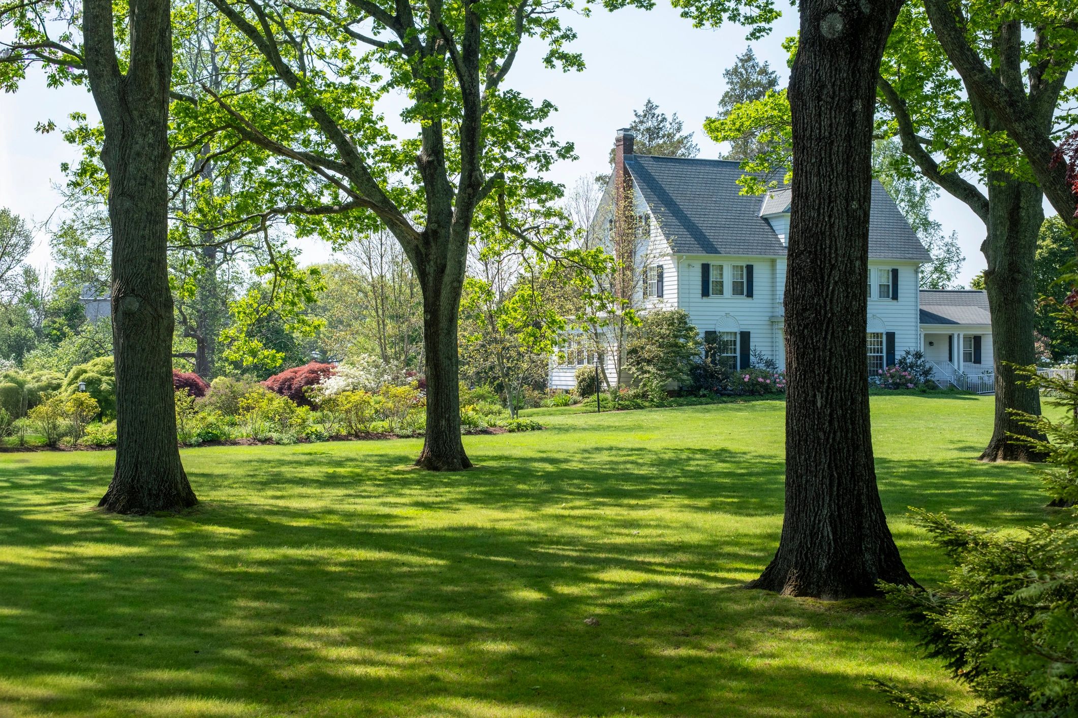 Luxury residential property exterior with landscaped grounds